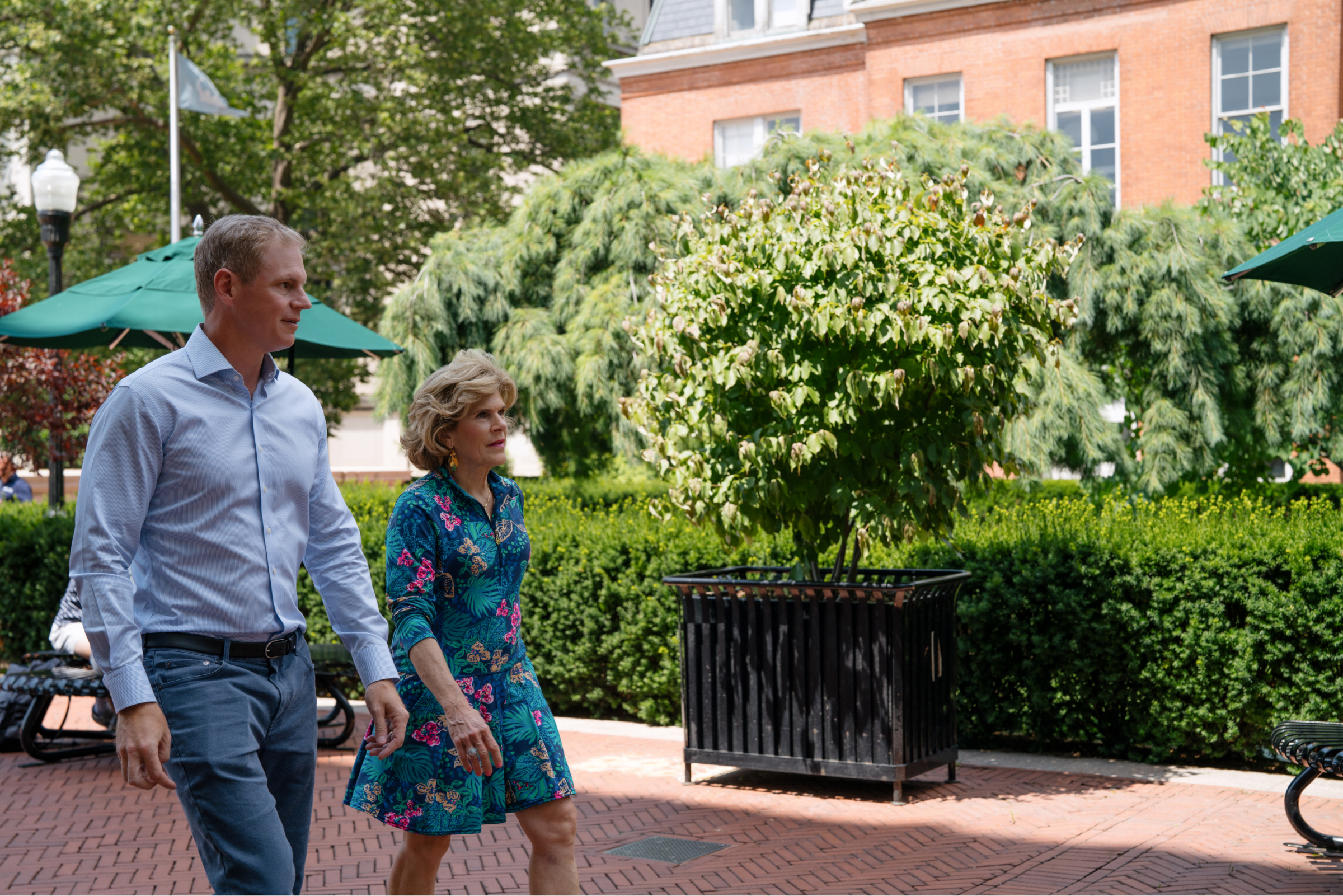 A couple walking together outdoors